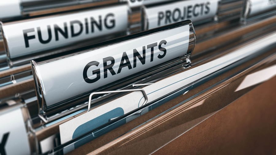 Image of file folders with headings labelled Funding, Grants, Projects