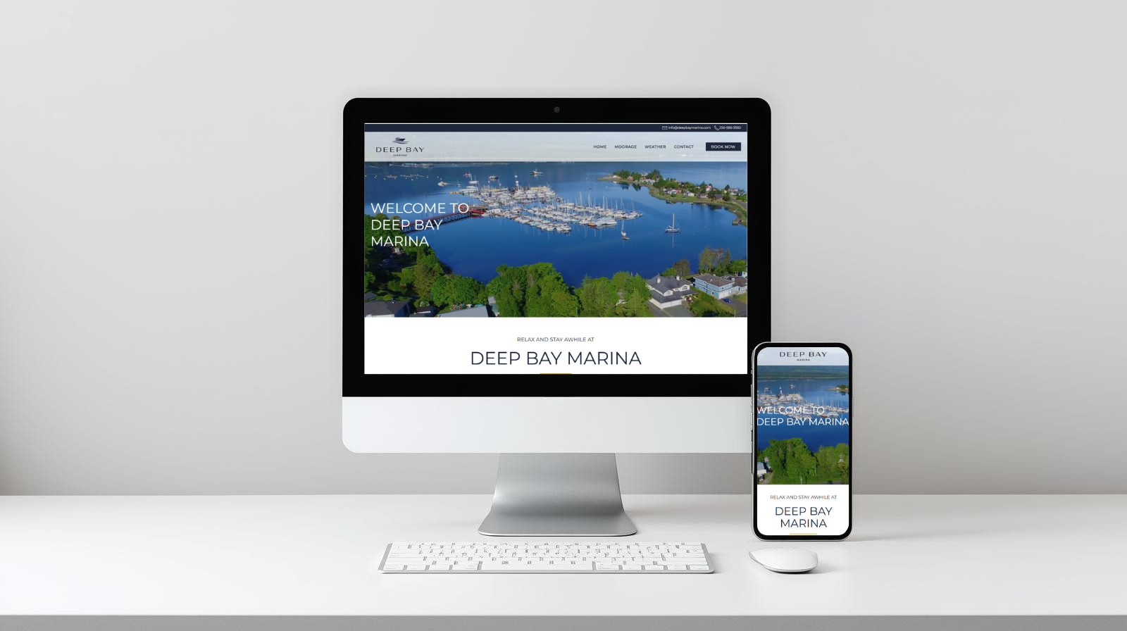 Computer and mobile screen showing the homepage of the Deep Bay Marina homepage.
