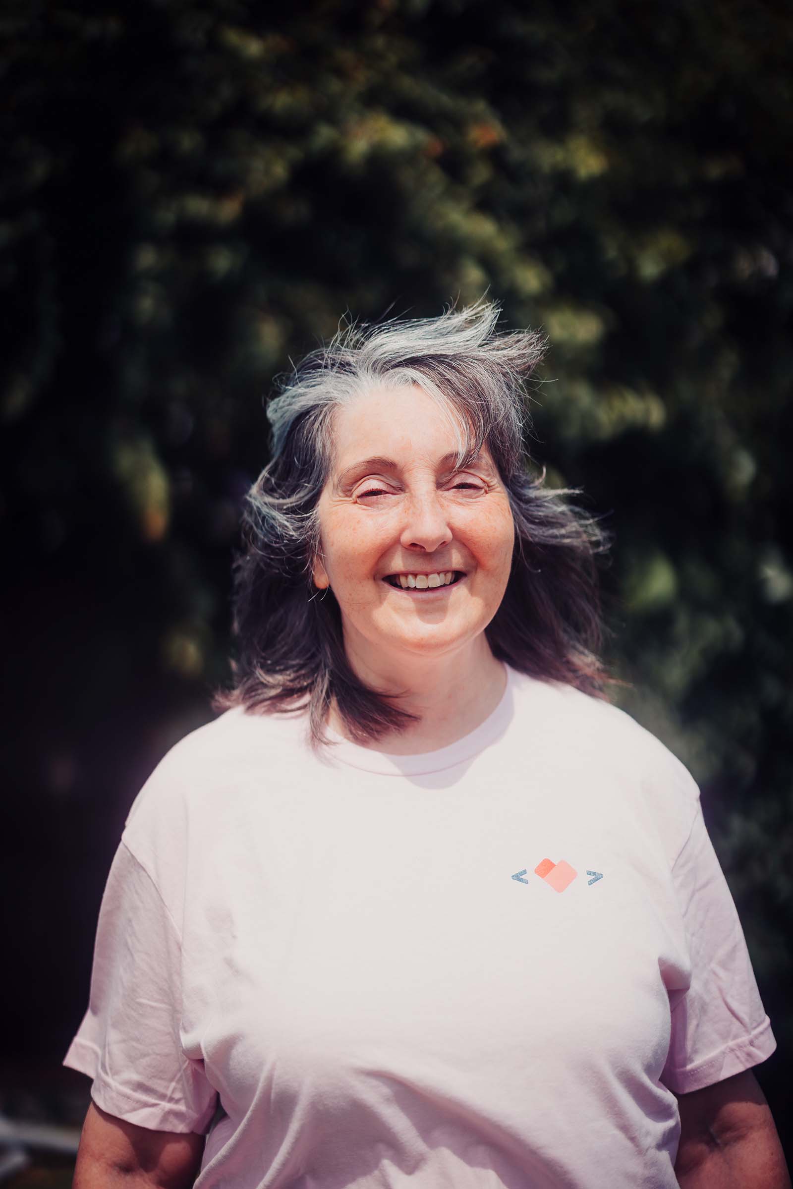 Headshot in the forest of Heather, Bookeeper at Websites Made With Love